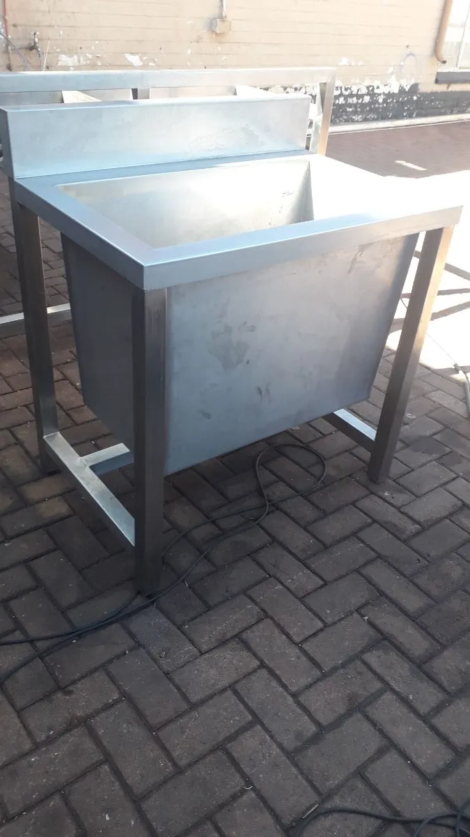 Deep stainless steel pot wash sink with splashback on tube frame